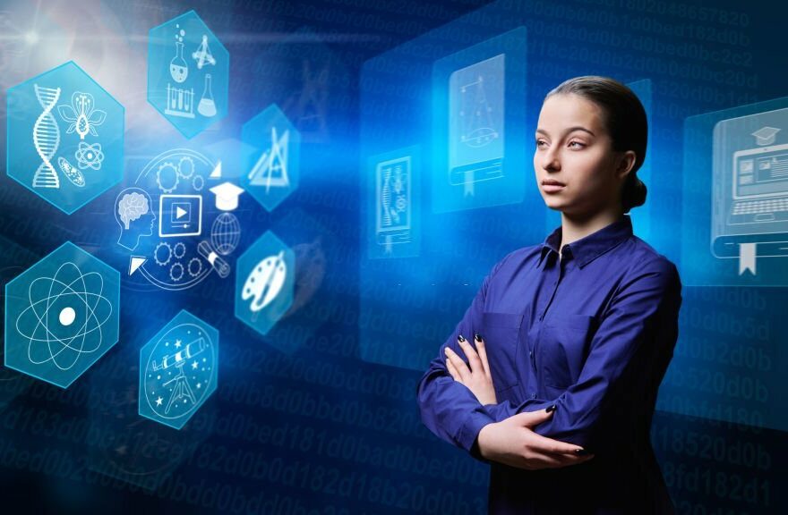 Portrait of high school student girl, background of digital screen with signs of various educational sciences and programs. E-education, e-learning, modern technologies in education